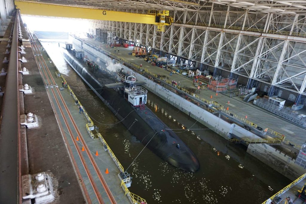 The USS Georgia prepares to exit the dry dock at Naval Submarine Base Kings Bay, Georgia, following an extended refit period.