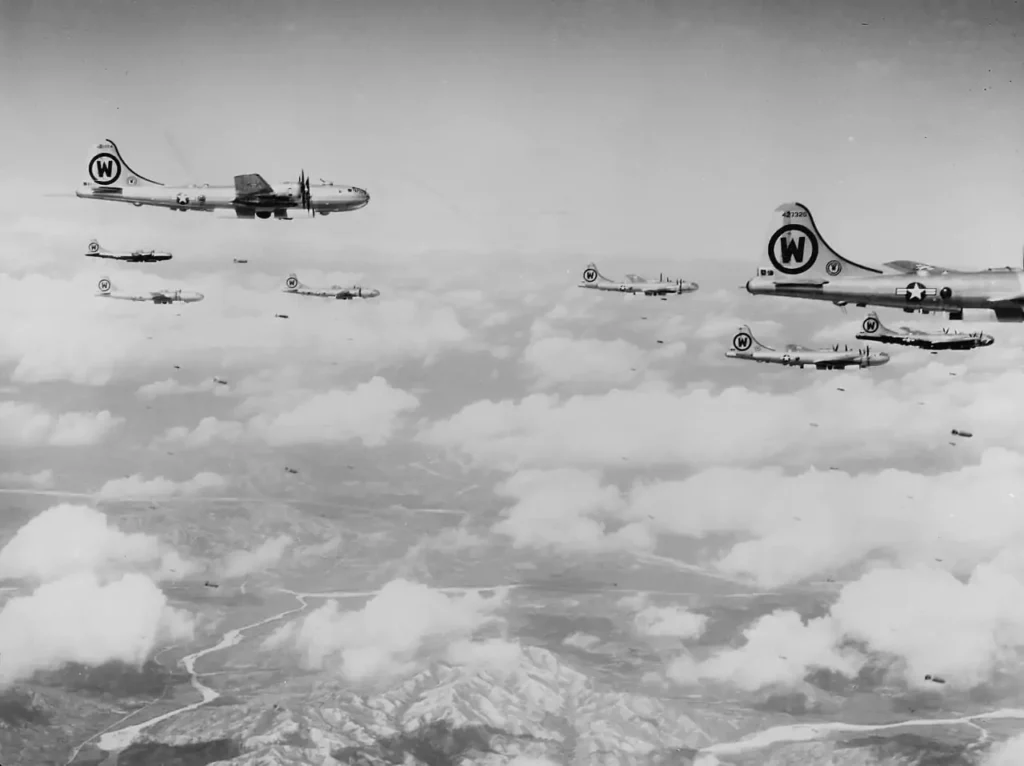 A formation of B-29s flying over enemy territory in Korea