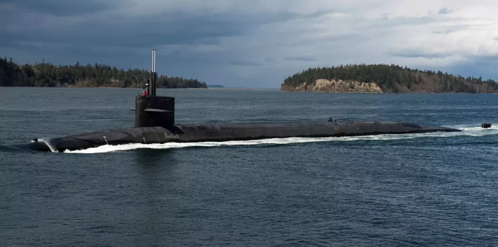 The USS Pennsylvania (SSBN 735) navigates through the Hood Canal on its way back to Naval Base Kitsap-Bangor after completing a strategic deterrent patrol.