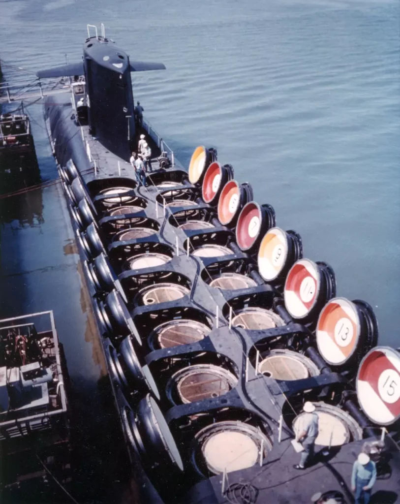 A docked USS Sam Rayburn (SSBN-635) with open tubes for Polaris missiles