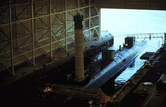 A UGM-133A Trident II submarine-launched ballistic missile being loaded into USS Lousiana (SSBN 743)