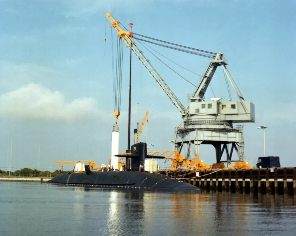 The nuclear-powered strategic missile submarine USS Ohio (SSBN-726) is loaded with a C-4 Trident I missile. 