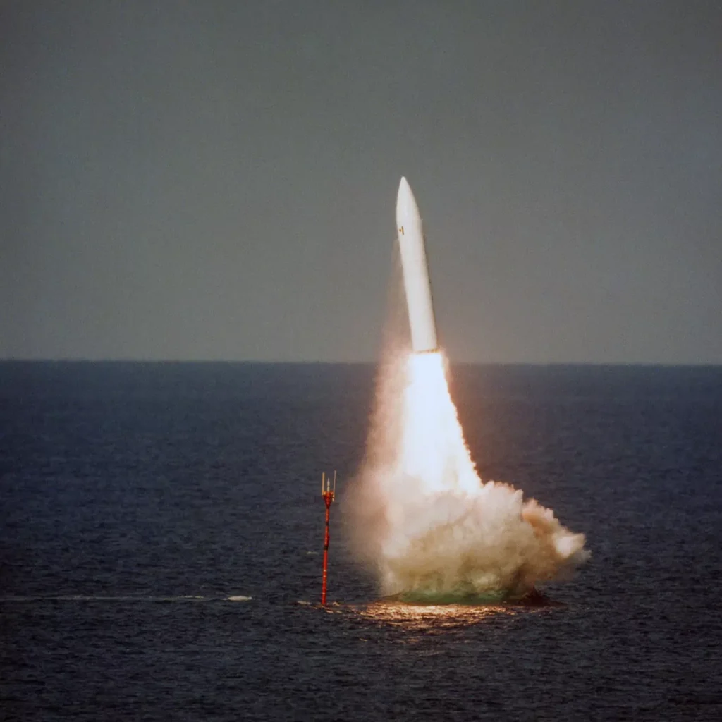 A UGM-27 Polaris submarine-launched ballistic missile takes off from the HMS Revenge (S 27), a British nuclear-powered ballistic missile submarine, in 1980.