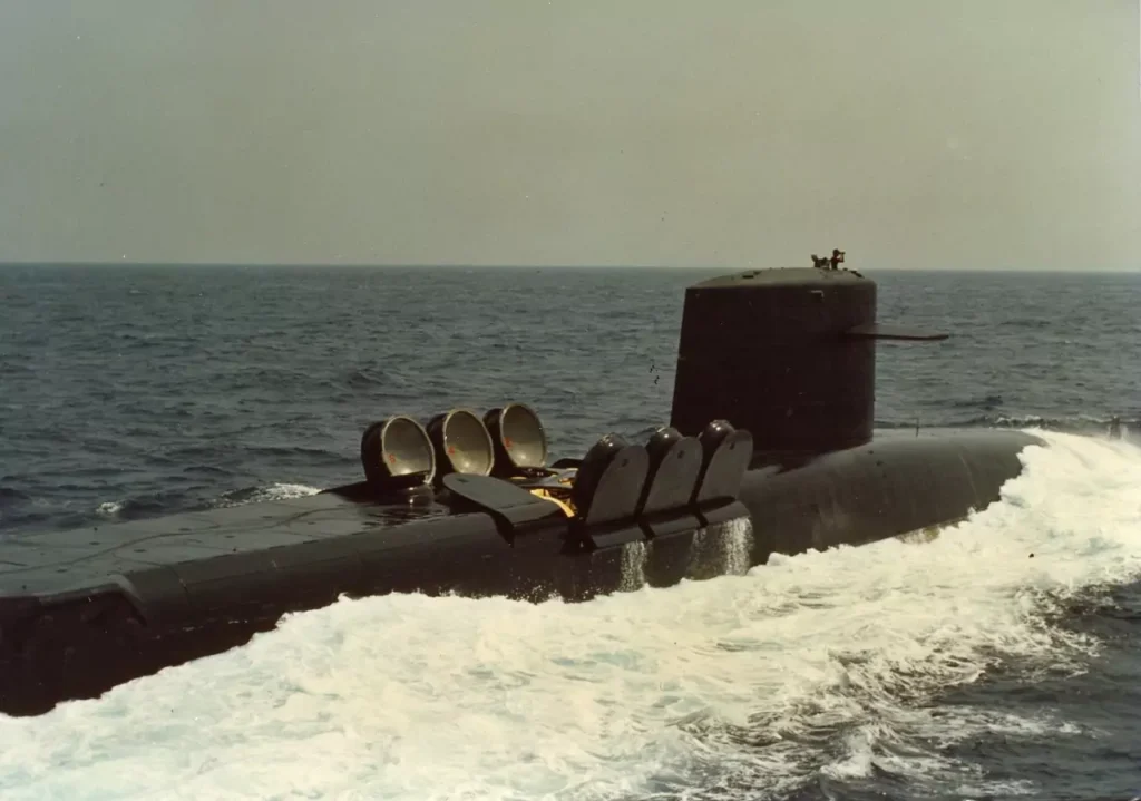 USS Woodrow Wilson SSBN-624 underway off the coast of South Carolina with some of the 16 Poseidon missile tube outer doors open.in 1977.