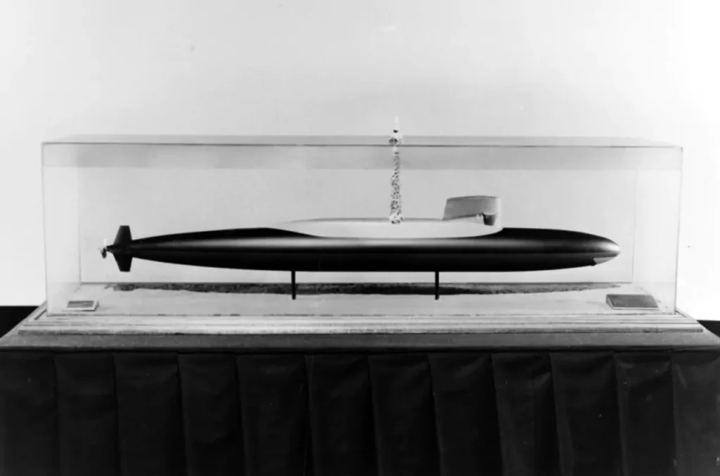 Model of USS George Washington (SSBN-598) showing the vessel launching a Polaris A-1 missile.