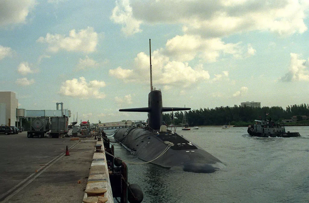 A starboard bow view of USS West Virginia (SSBN-736) tied up at a pier. She was the third TRIDENT II (D5) submarine and the eleventh Ohio class submarine.